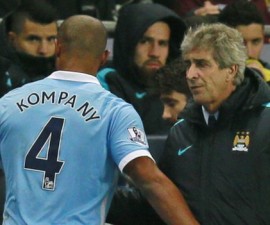 87740915_kompany_pellegrini_reuters.jpg